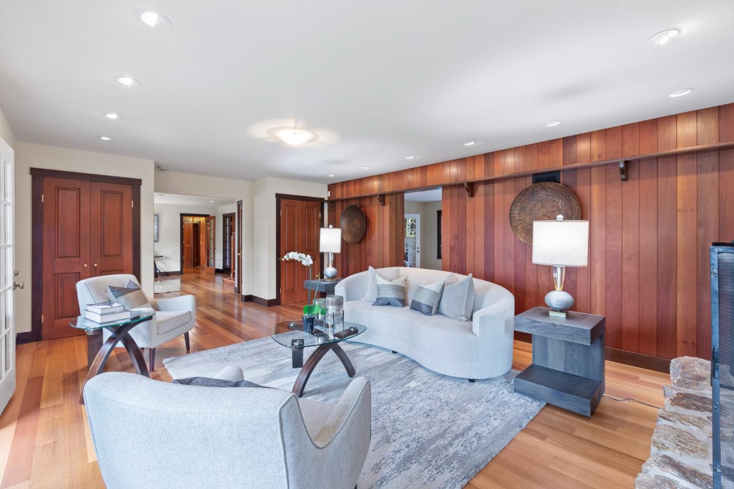 36 Skyline Drive Woodside, CA 94062 - Photo 13 of 67 a living room with furniture and wooden floor