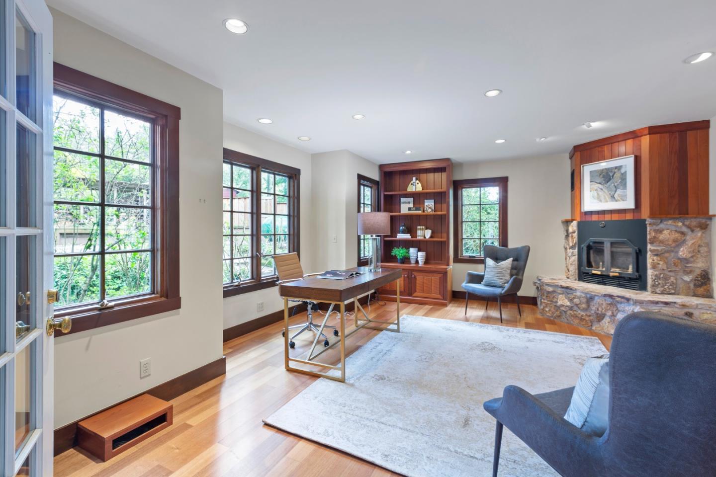 36 Skyline Drive Woodside, CA 94062 - Photo 15 of 67 a living room with furniture and a fireplace