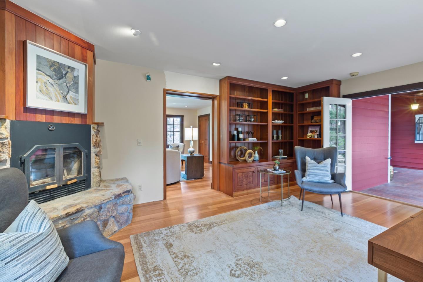 36 Skyline Drive Woodside, CA 94062 - Photo 16 of 67 a living room with furniture and a fireplace