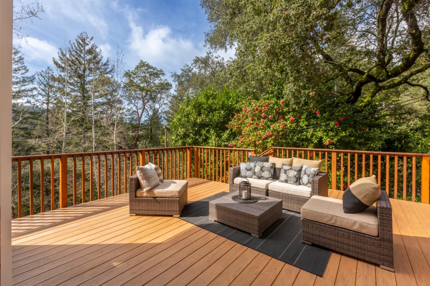 36 Skyline Drive Woodside, CA 94062 - Photo 26 of 67 a balcony with wooden floor and furniture