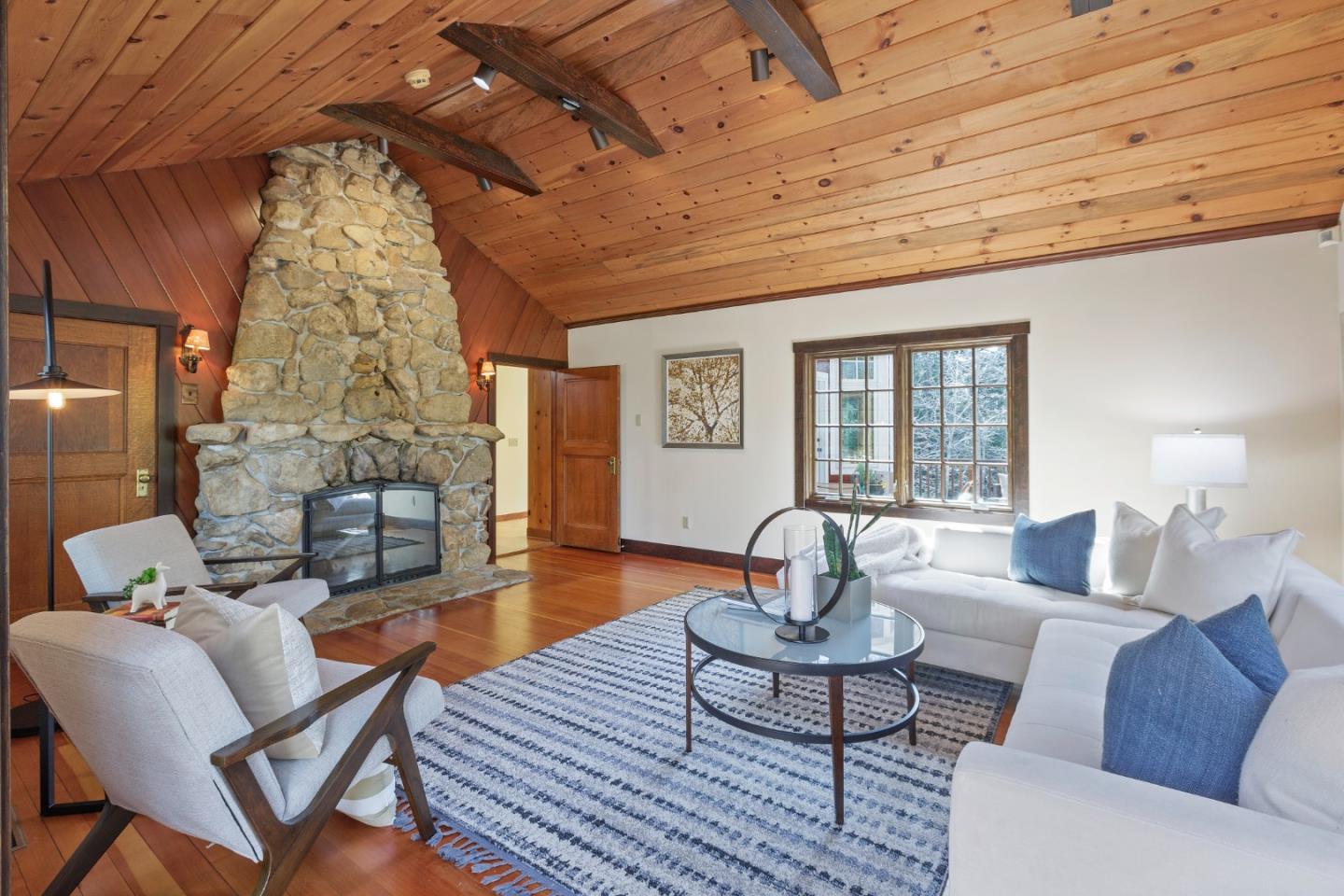 36 Skyline Drive Woodside, CA 94062 - Photo 32 of 67 a living room with furniture and wooden floor