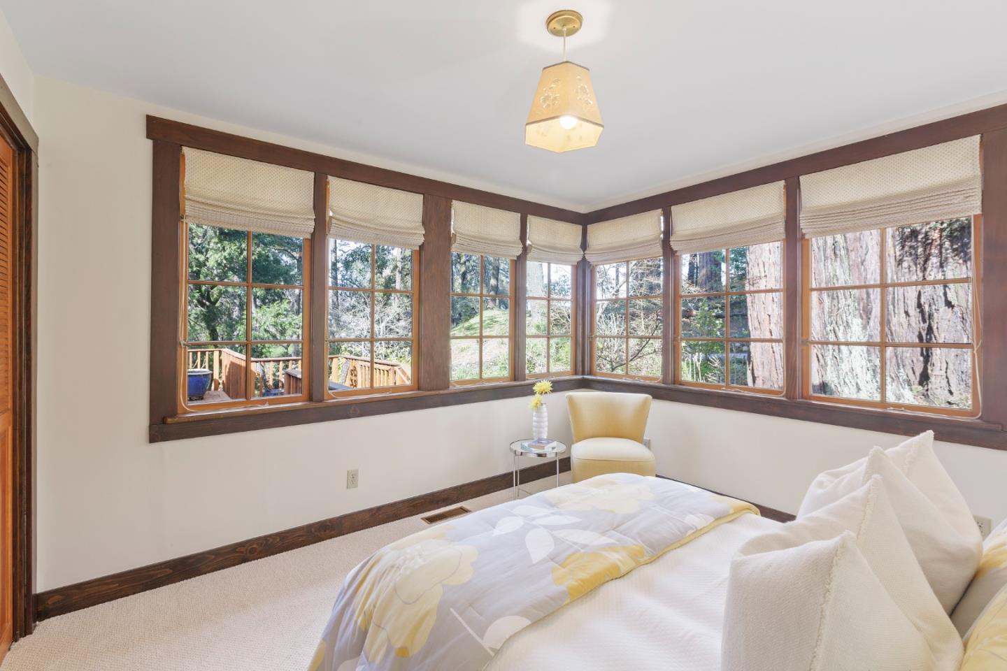36 Skyline Drive Woodside, CA 94062 - Photo 39 of 67 a spacious bedroom with a large bed and a large window