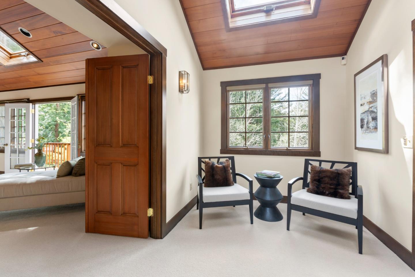 36 Skyline Drive Woodside, CA 94062 - Photo 42 of 67 a living room with furniture and a window