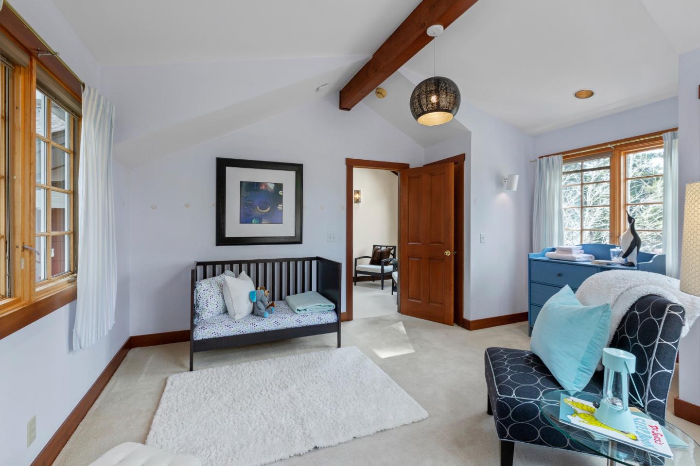 36 Skyline Drive Woodside, CA 94062 - Photo 44 of 67 a bedroom with furniture and a window