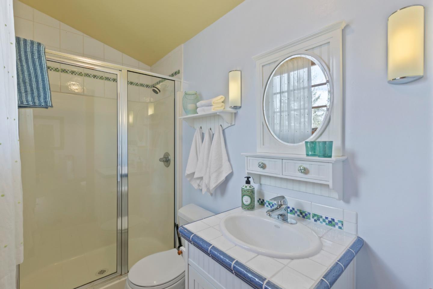 36 Skyline Drive Woodside, CA 94062 - Photo 45 of 67 a bathroom with a sink a toilet and shower