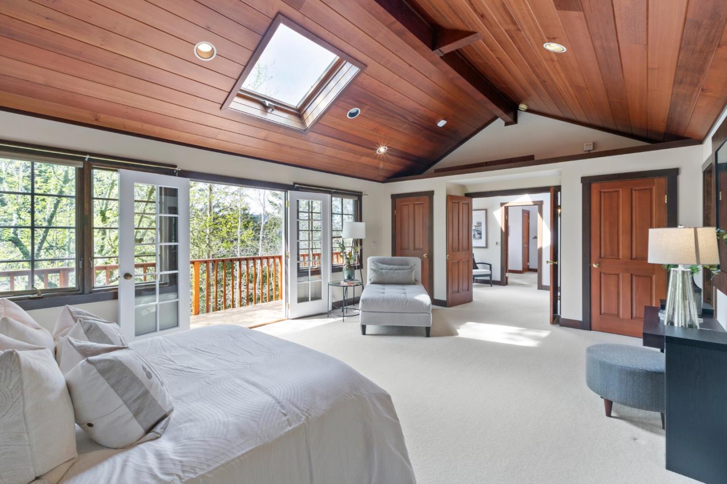 36 Skyline Drive Woodside, CA 94062 - Photo 49 of 67 a spacious bedroom with a large bed and a large window with the outer view