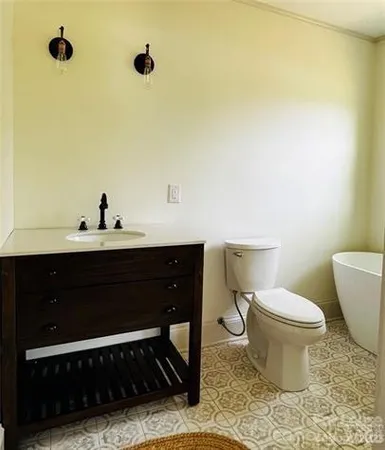 a bathroom with a sink and a toilet