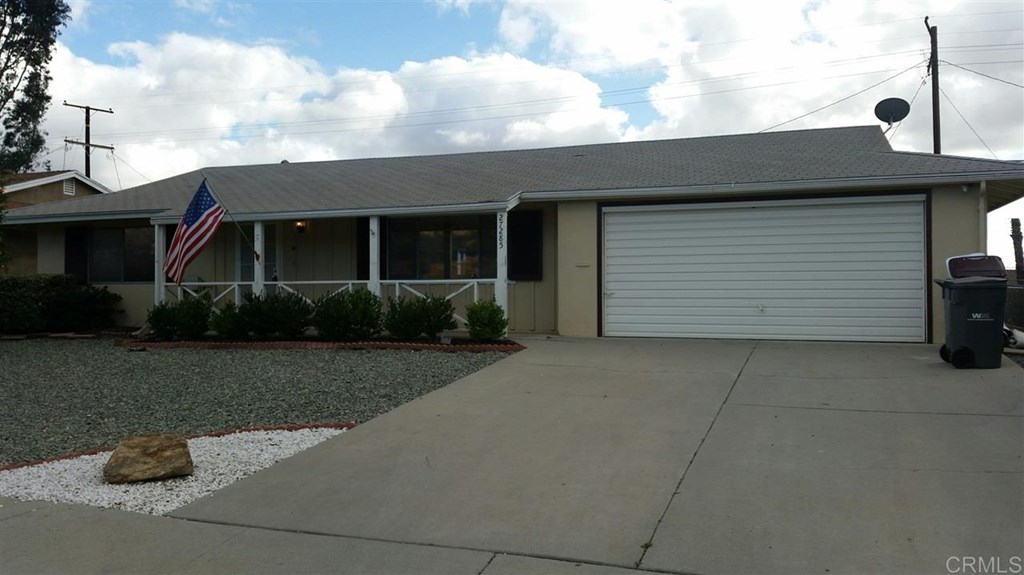 27285 El Rancho Road Sun City, CA 92586 - Photo 1 of 1 a front view of a house with garage