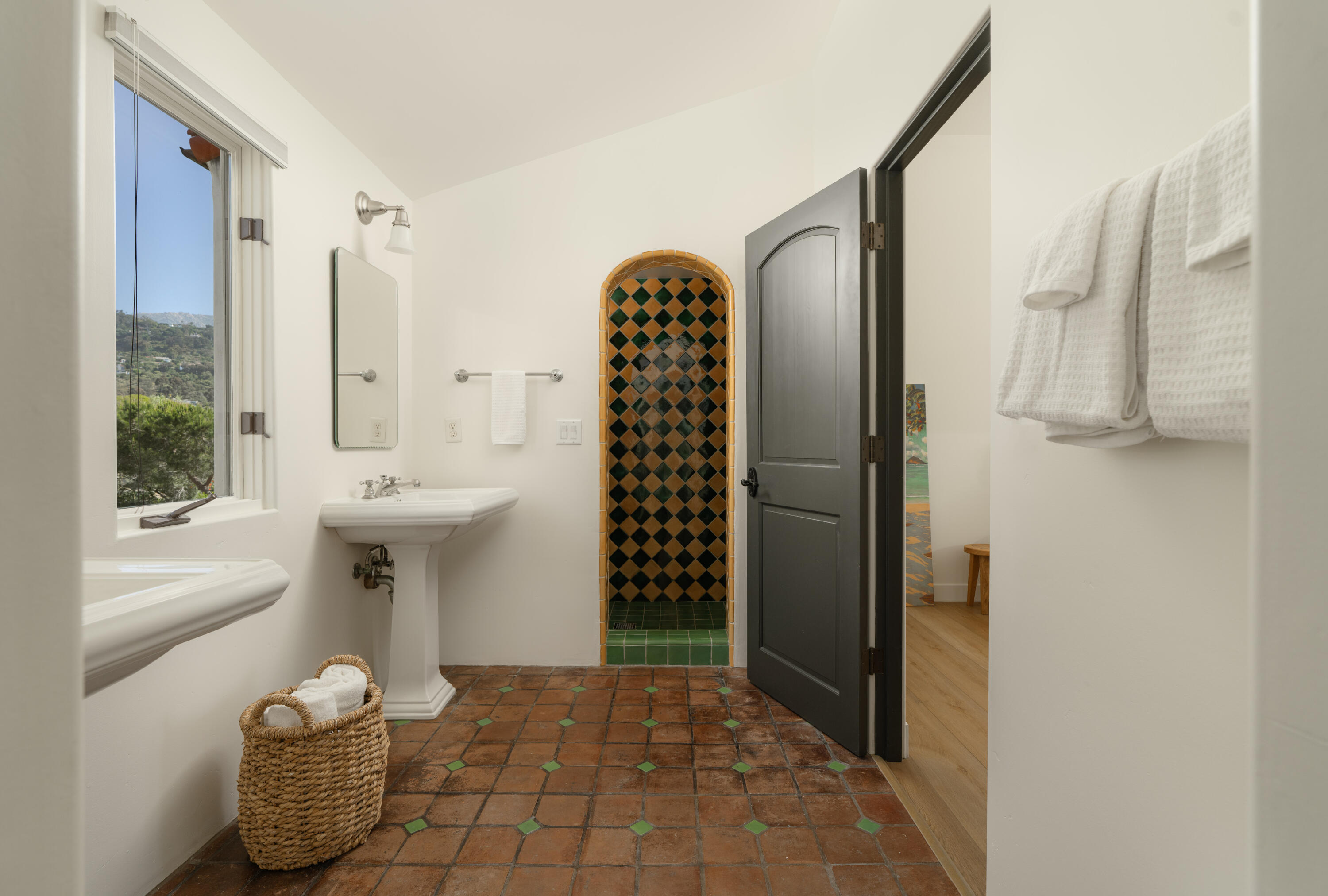 1011 Rinconada Road, Unit G Santa Barbara, CA 93101 - Photo 14 of 31 a bathroom with a sink toilet and shower
