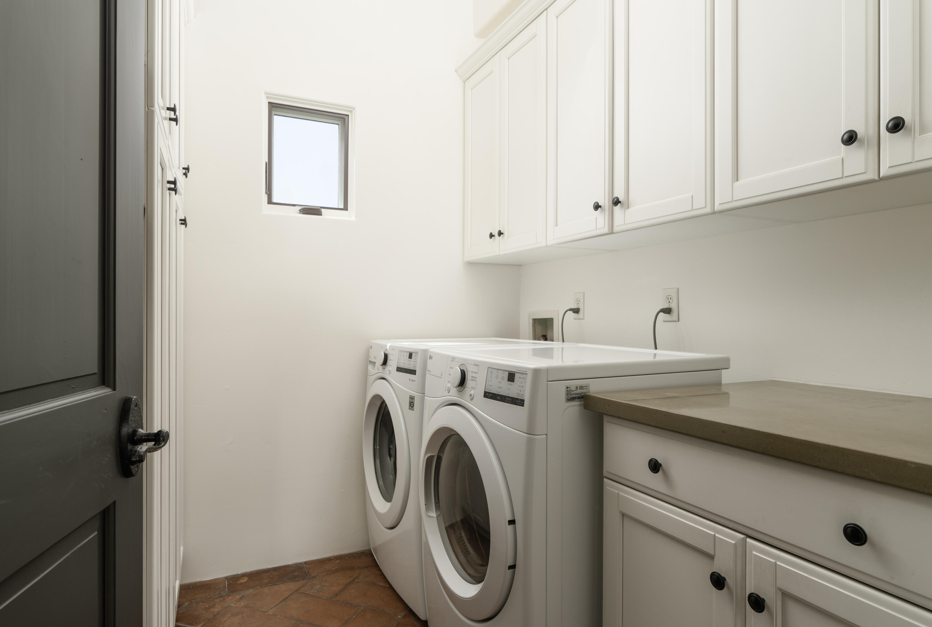 1011 Rinconada Road, Unit G Santa Barbara, CA 93101 - Photo 23 of 31 a utility room with dryer and washer