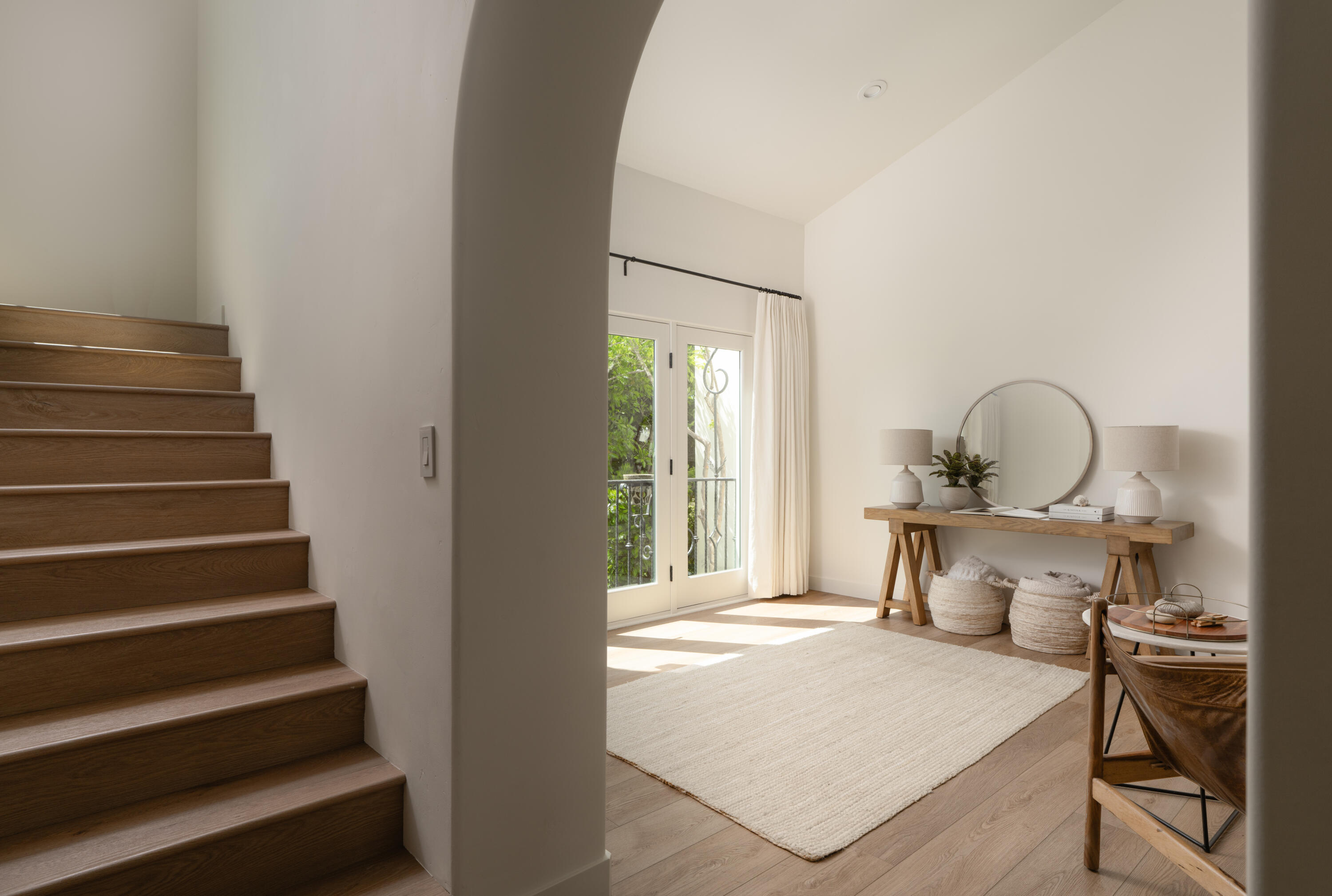 1011 Rinconada Road, Unit G Santa Barbara, CA 93101 - Photo 6 of 31 a bedroom with a bed and a table