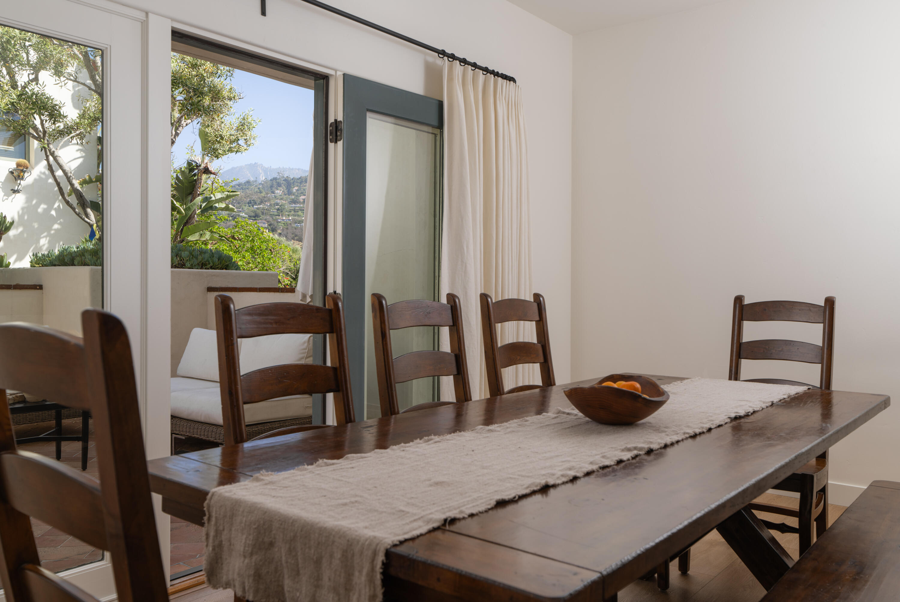 1011 Rinconada Road, Unit G Santa Barbara, CA 93101 - Photo 10 of 31 a view of a dining room with furniture and window