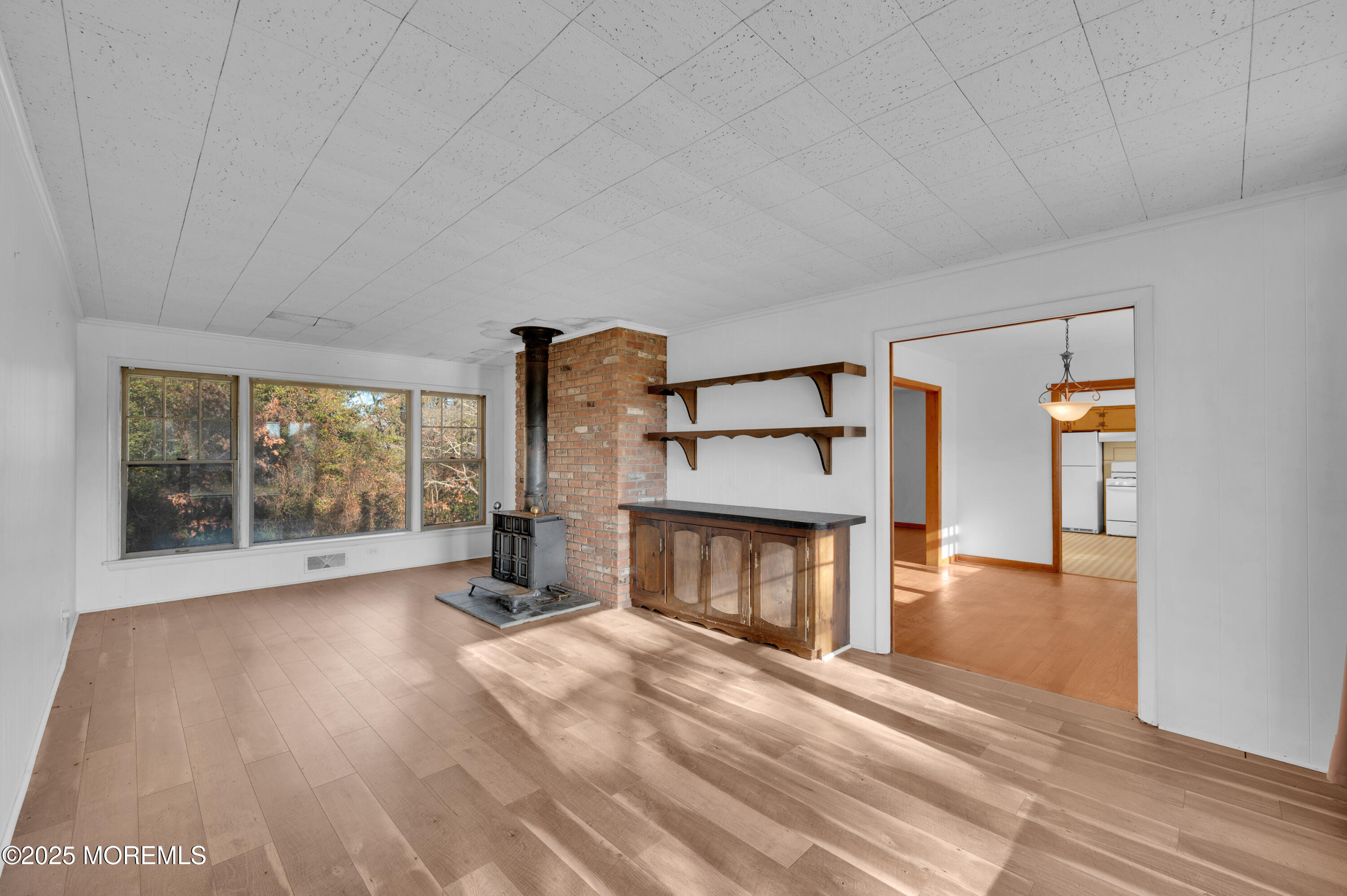 920 Ridge Road Brick, NJ 08724 - Photo 11 of 36 a bedroom with a bed and wooden floor