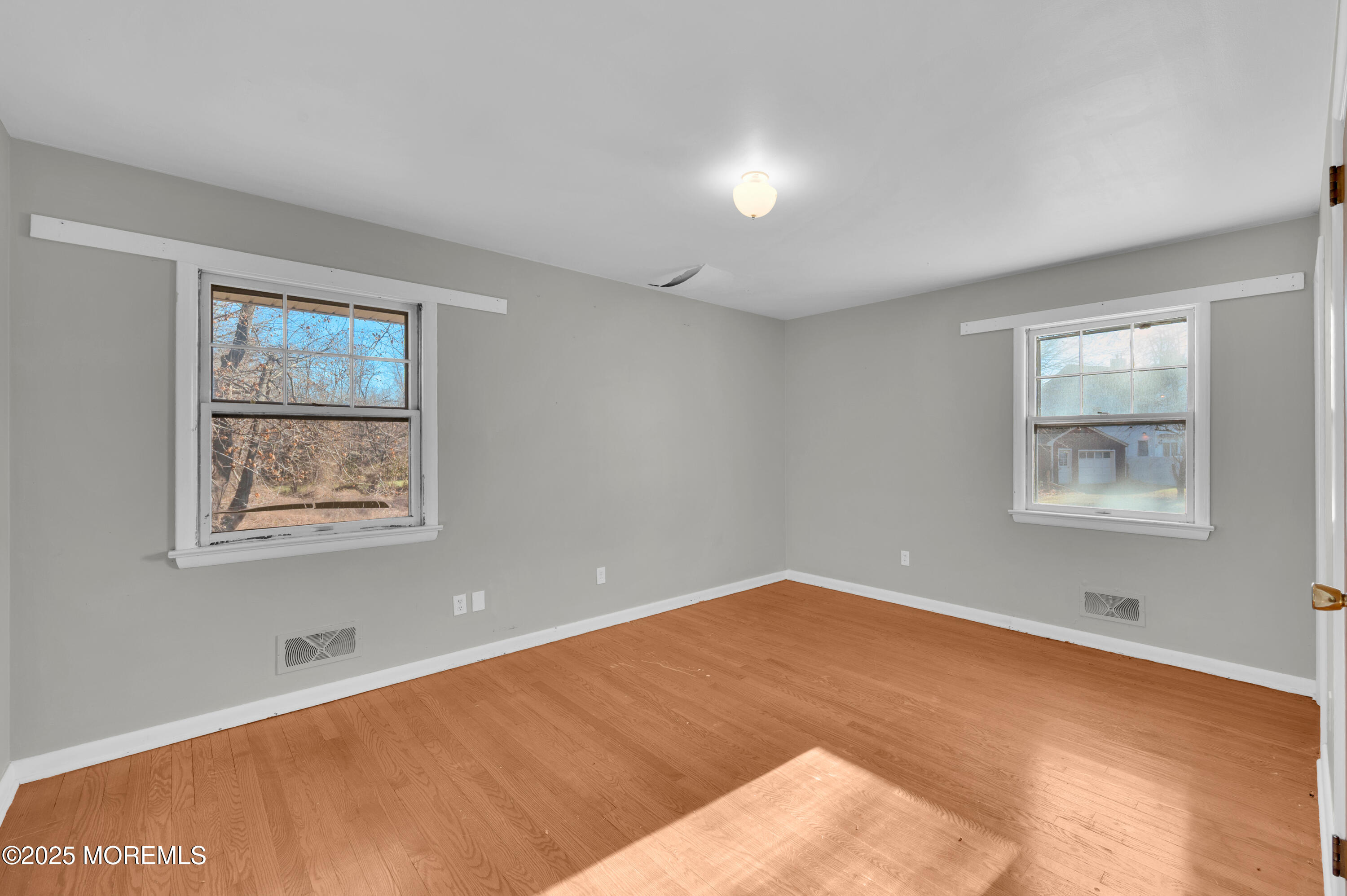 920 Ridge Road Brick, NJ 08724 - Photo 18 of 36 a view of an empty room with a window