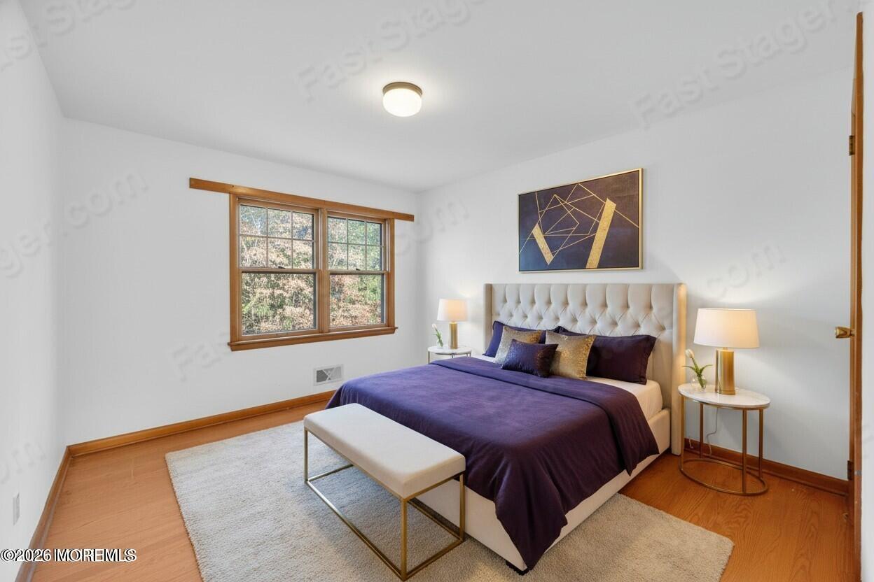 920 Ridge Road Brick, NJ 08724 - Photo 22 of 36 a bedroom with bed and a window