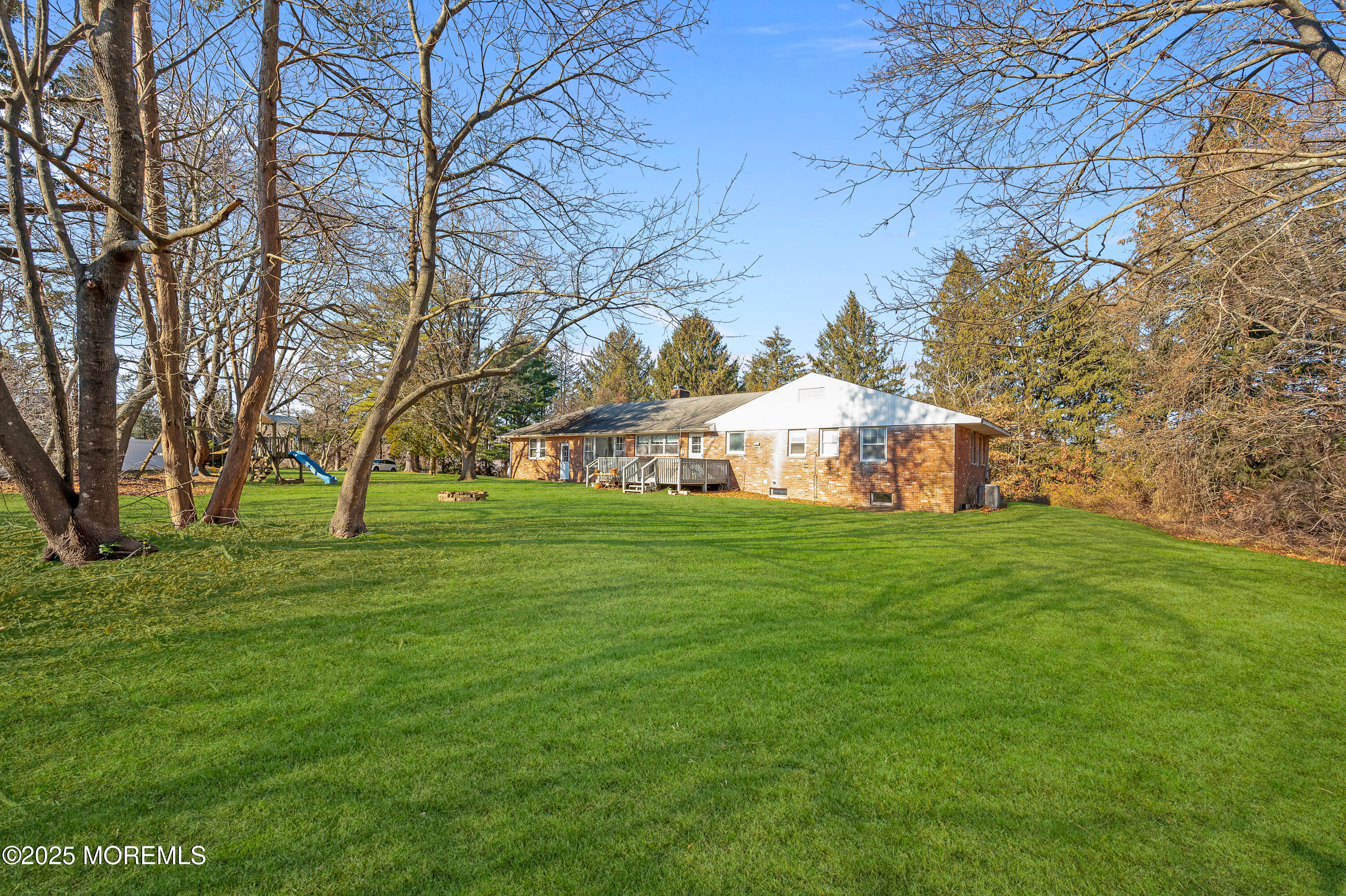 920 Ridge Road Brick, NJ 08724 - Photo 26 of 36 a view of yard with tree s