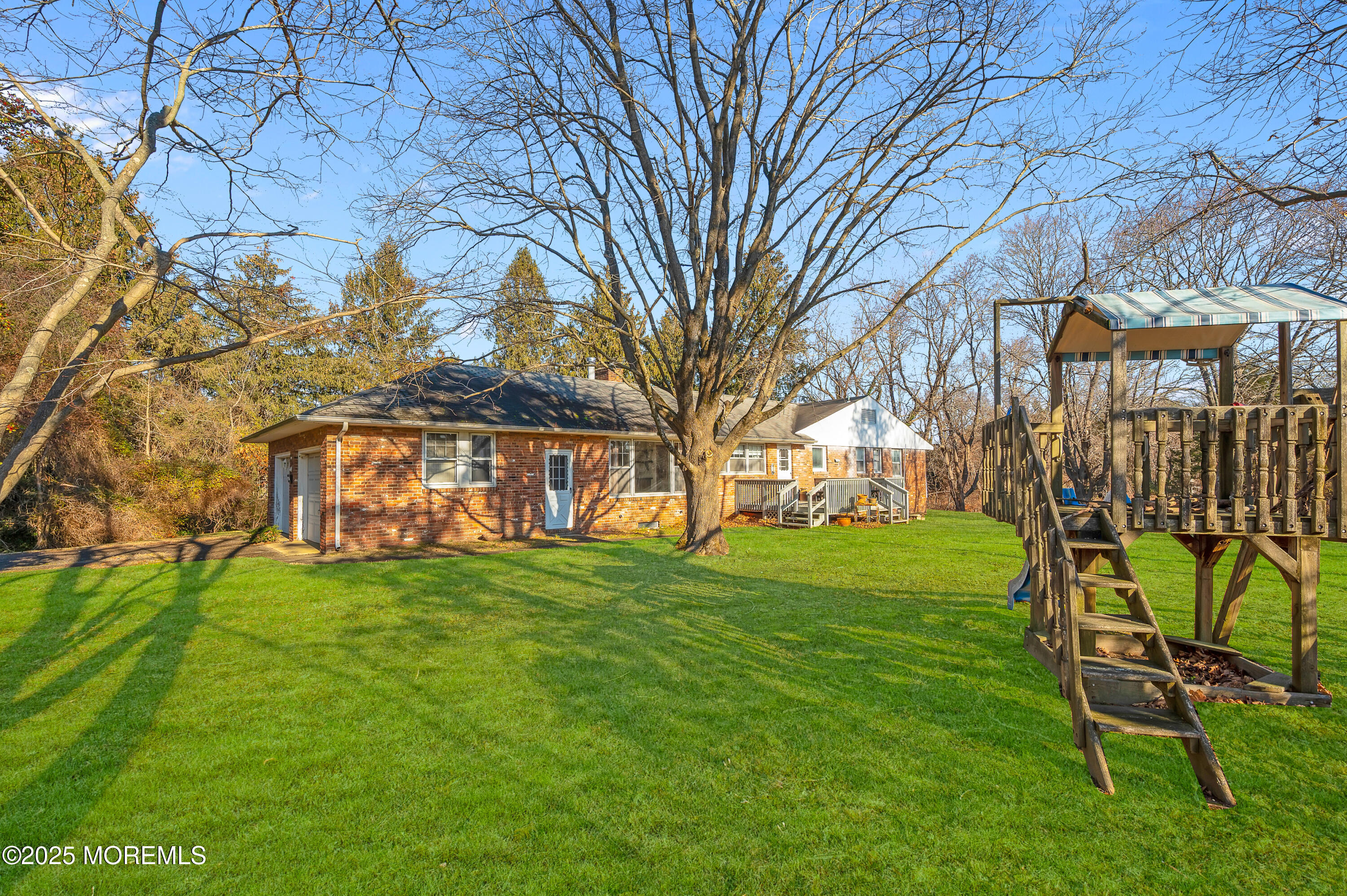 920 Ridge Road Brick, NJ 08724 - Photo 29 of 36 a view of a yard with a house in the background