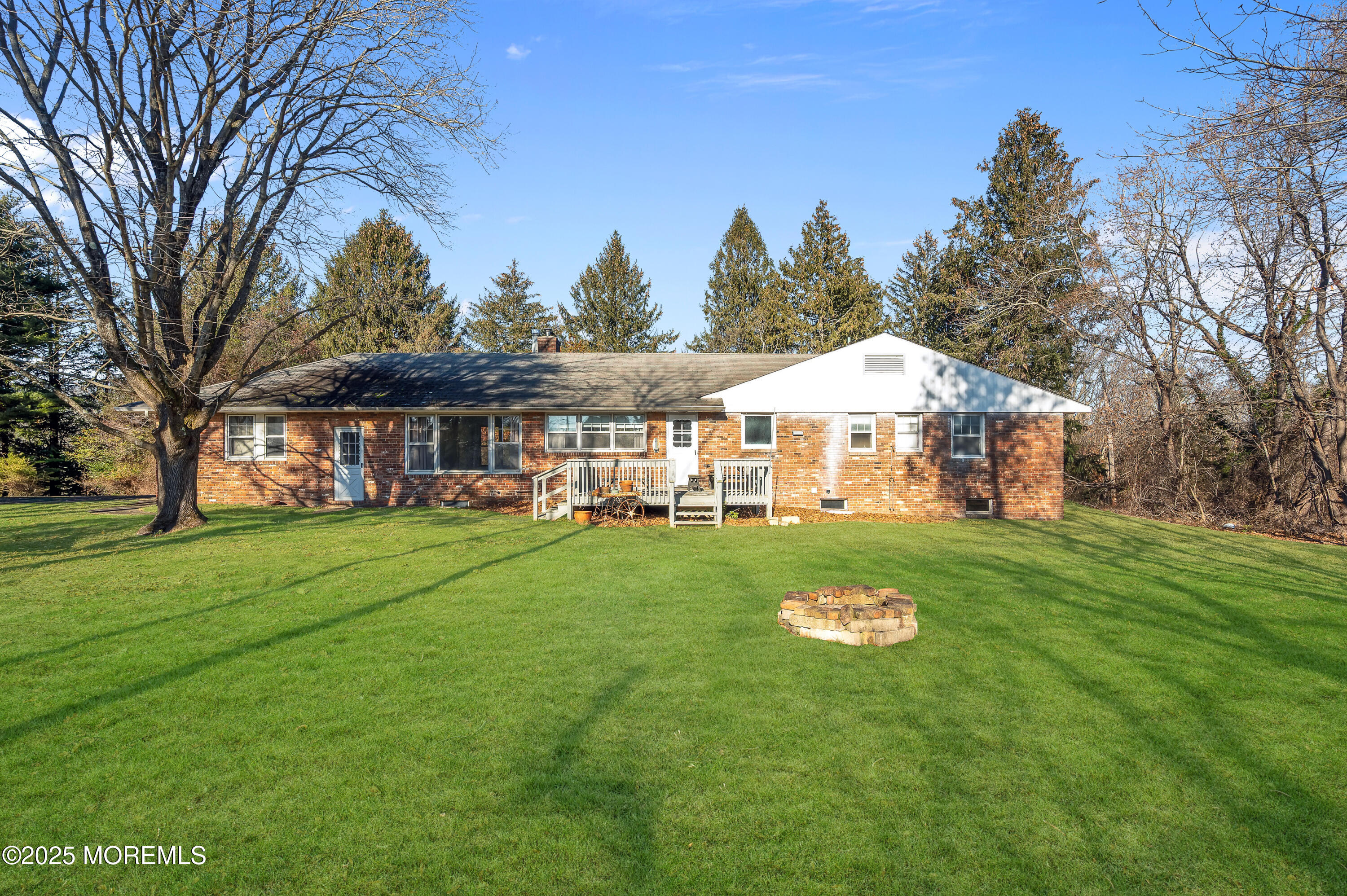 920 Ridge Road Brick, NJ 08724 - Photo 4 of 36 a front view of a house with garden