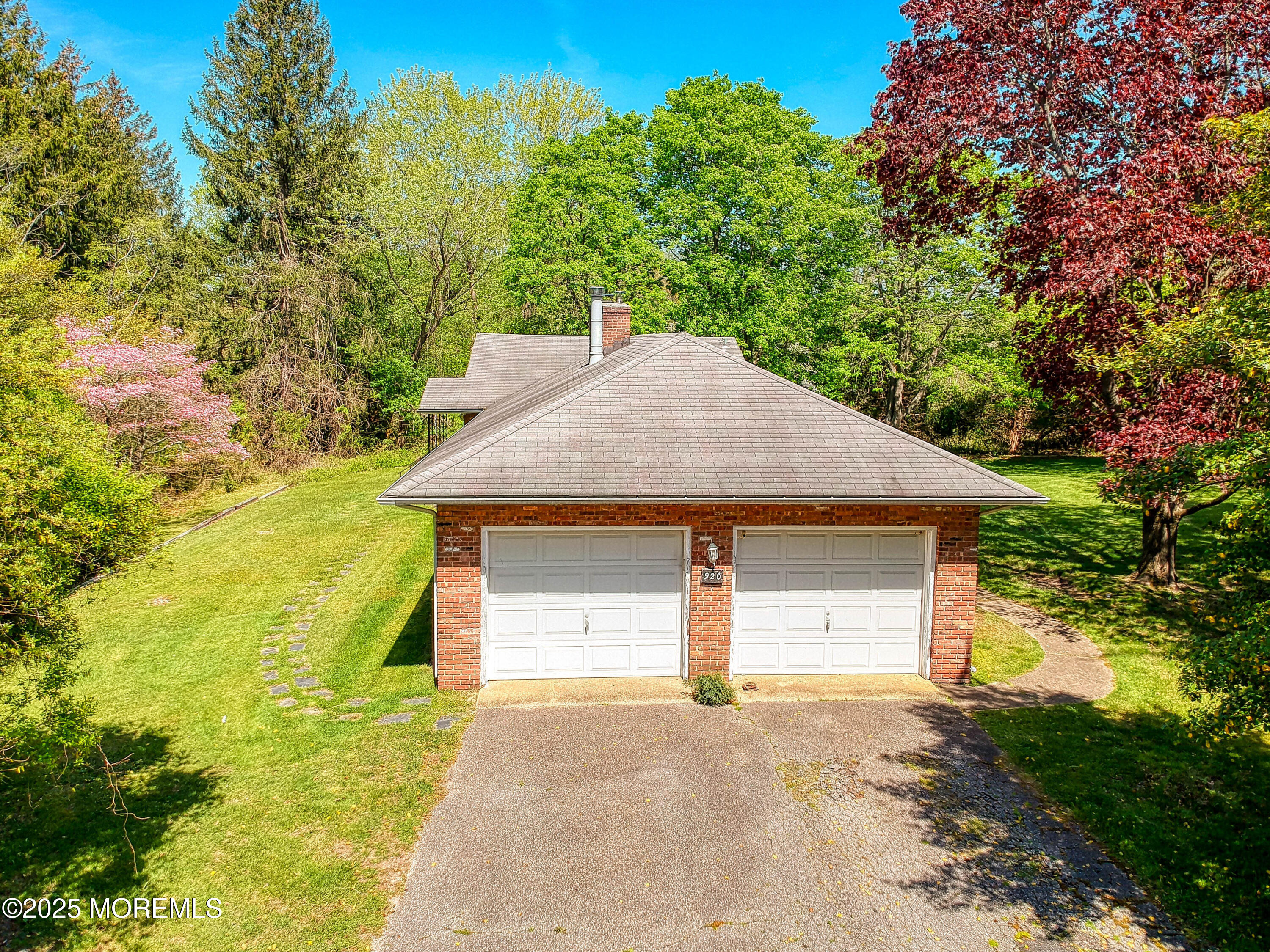 920 Ridge Road Brick, NJ 08724 - Photo 5 of 36 a house with trees in the background
