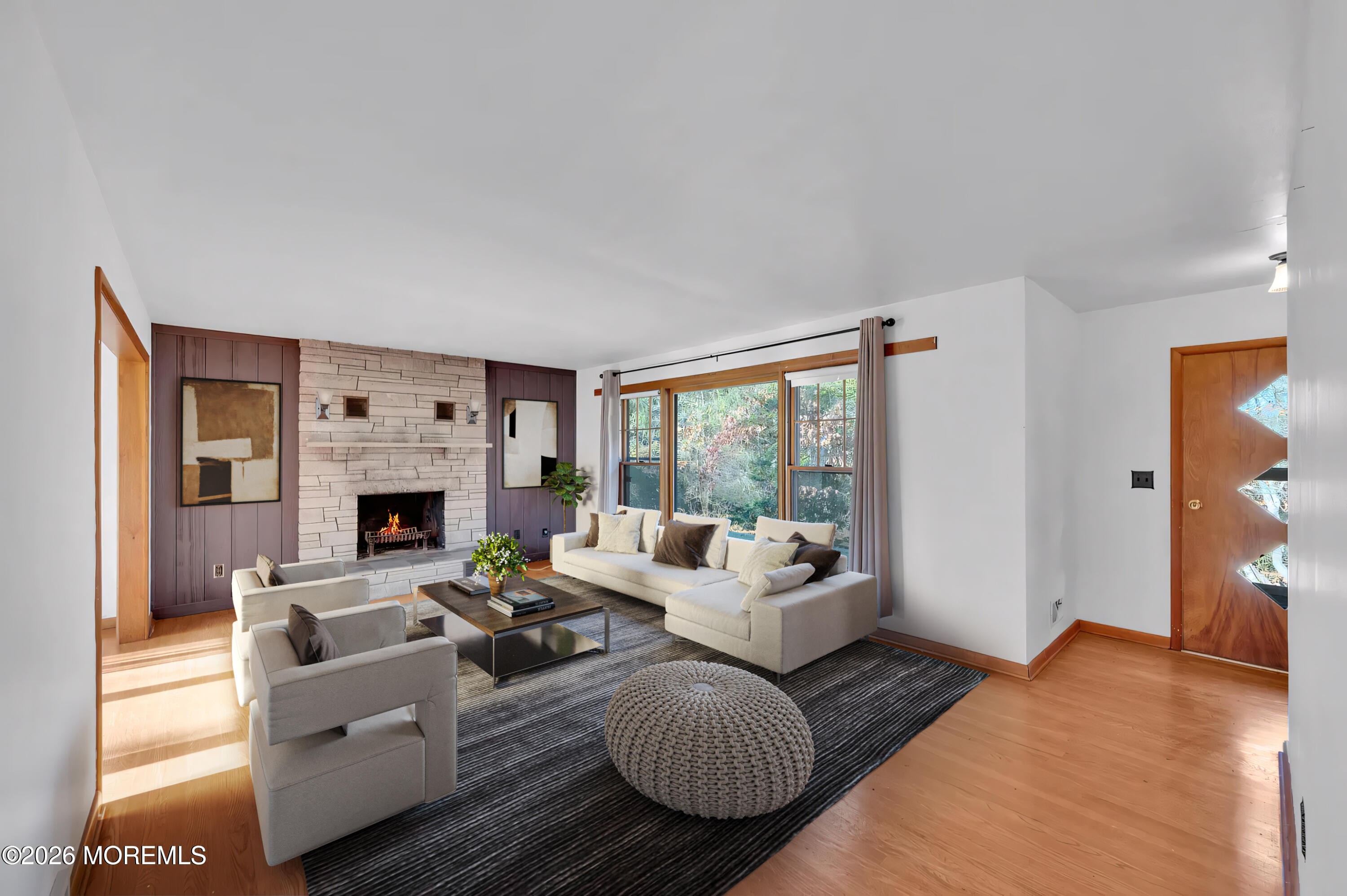 920 Ridge Road Brick, NJ 08724 - Photo 7 of 36 a living room with furniture and a fireplace