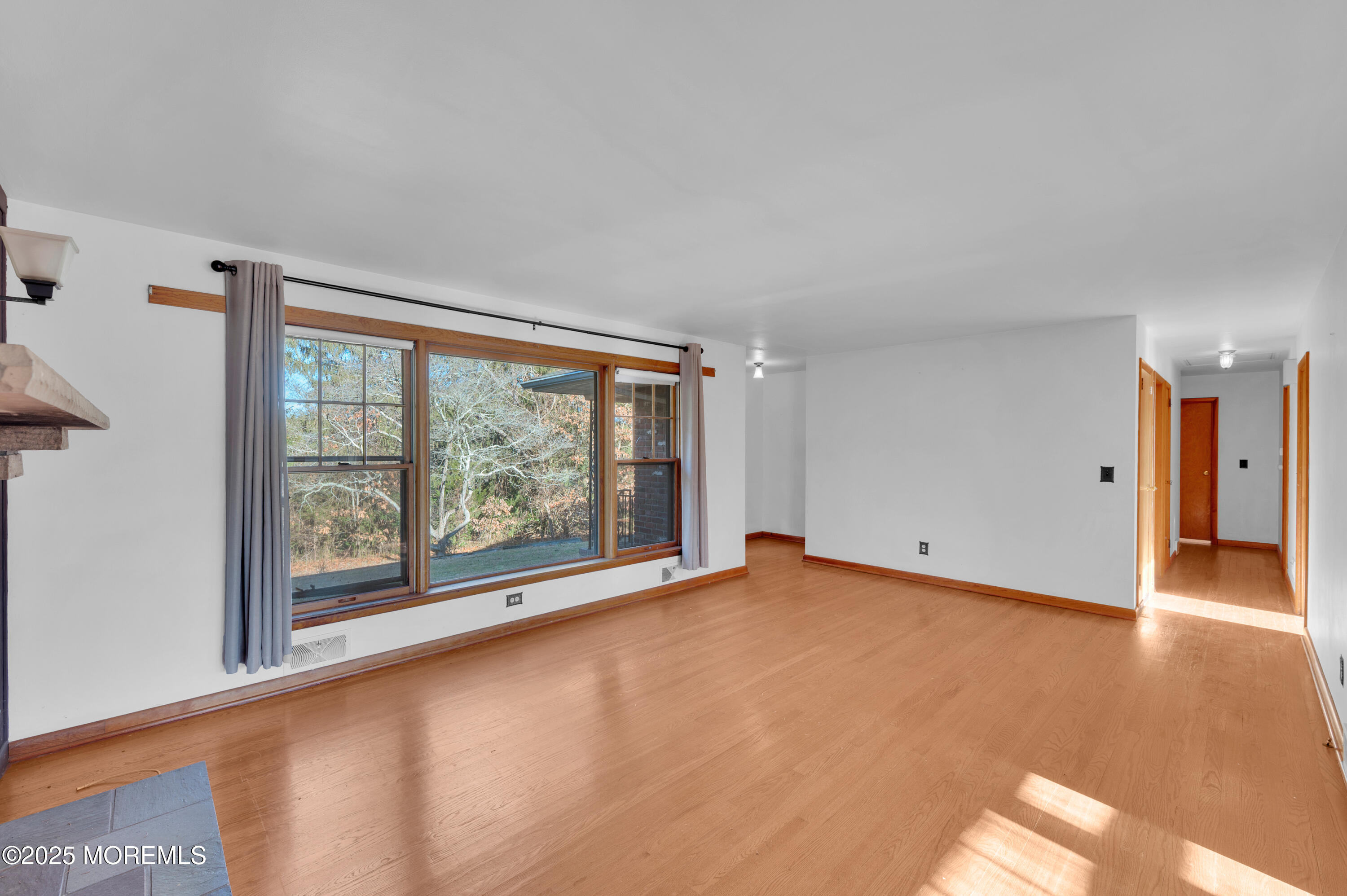 920 Ridge Road Brick, NJ 08724 - Photo 8 of 36 wooden floor in an empty room with a window