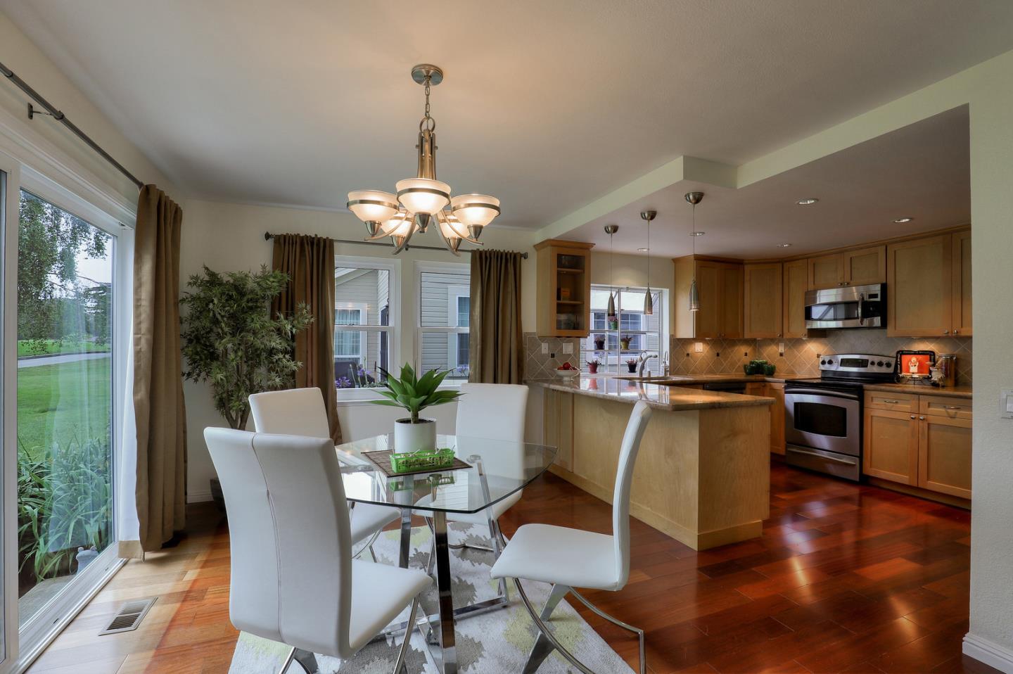 4 Muirfield Road Half Moon Bay, CA 94019 - Photo 12 of 40 a view of a dining room with furniture window and wooden floor