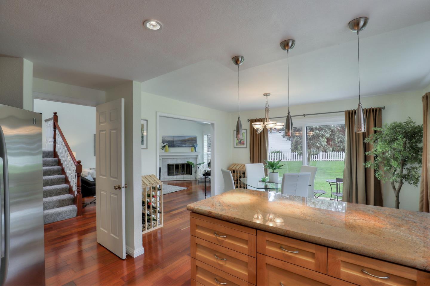 4 Muirfield Road Half Moon Bay, CA 94019 - Photo 13 of 40 a kitchen with counter top space and wooden floor