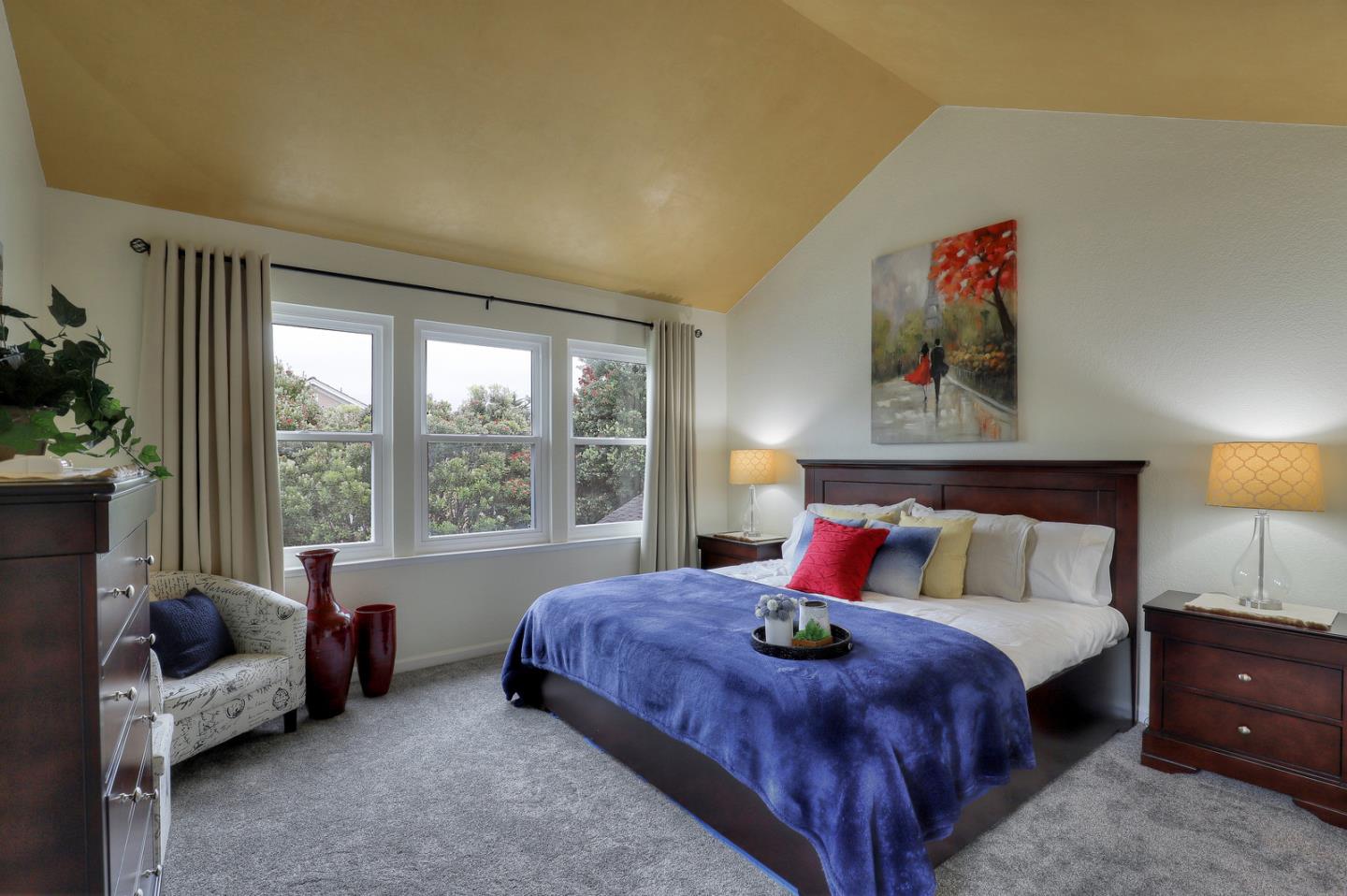 4 Muirfield Road Half Moon Bay, CA 94019 - Photo 15 of 40 a bedroom with a bed couch and a large window