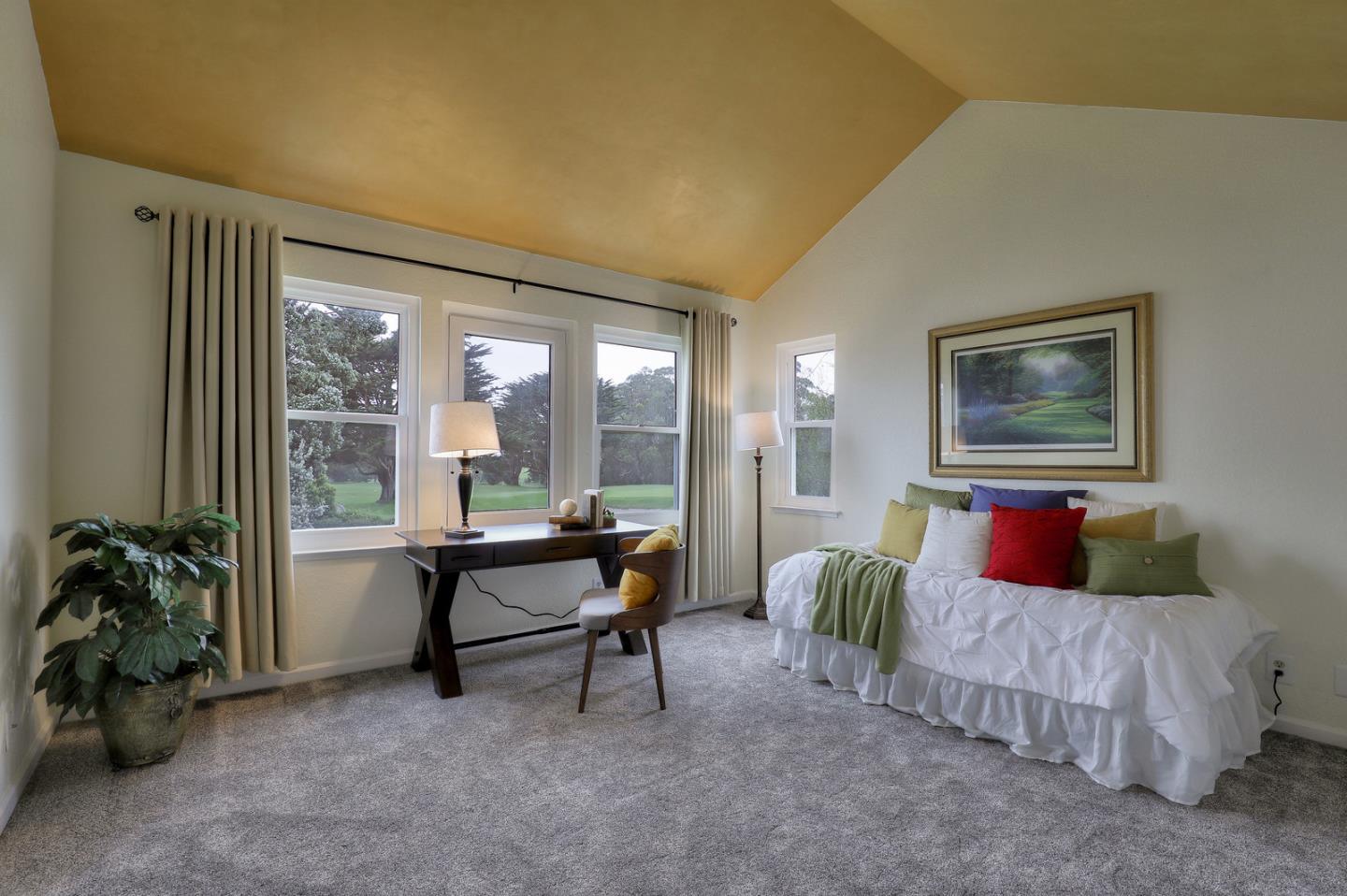 4 Muirfield Road Half Moon Bay, CA 94019 - Photo 17 of 40 a living room with furniture and a large window