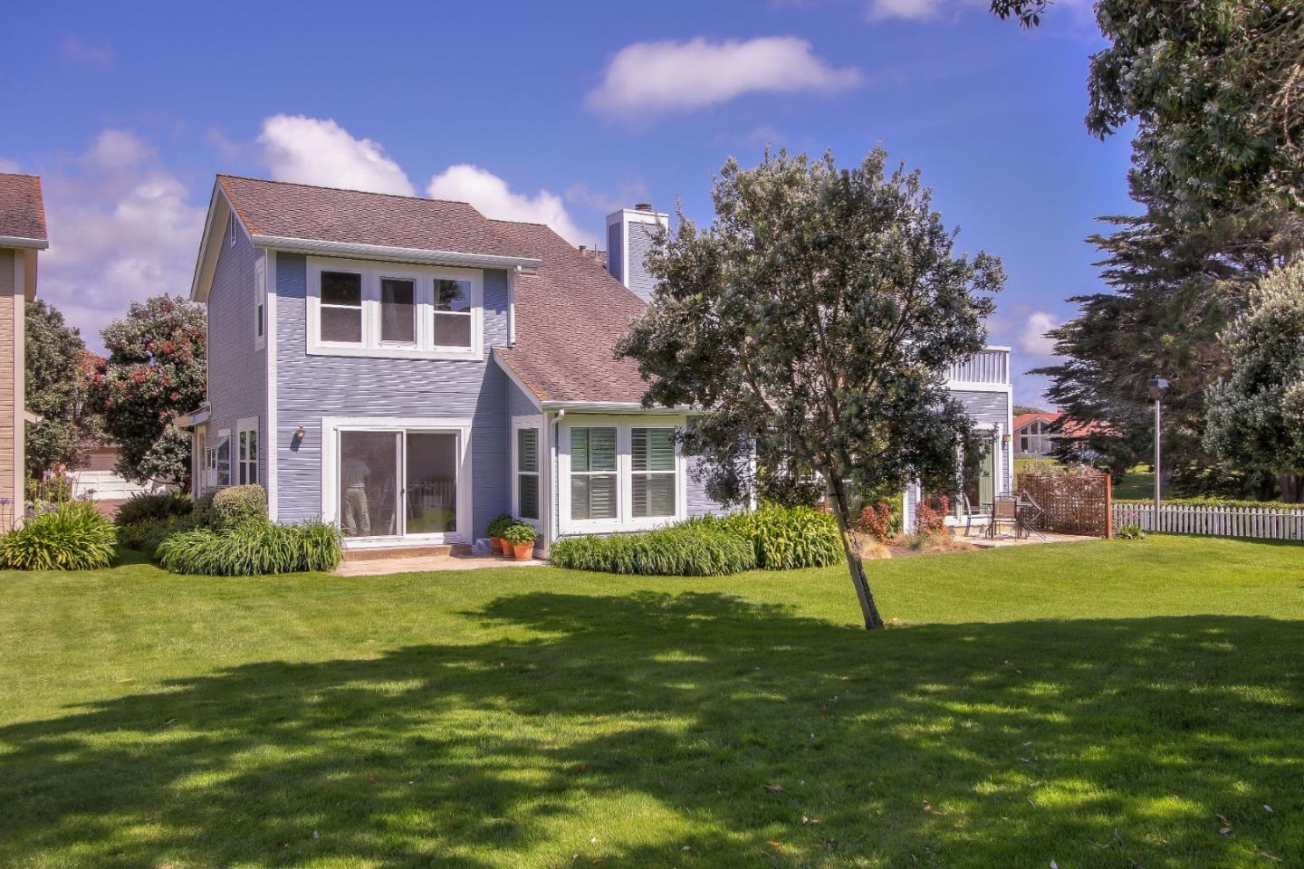 4 Muirfield Road Half Moon Bay, CA 94019 - Photo 23 of 40 a front view of a house with a yard