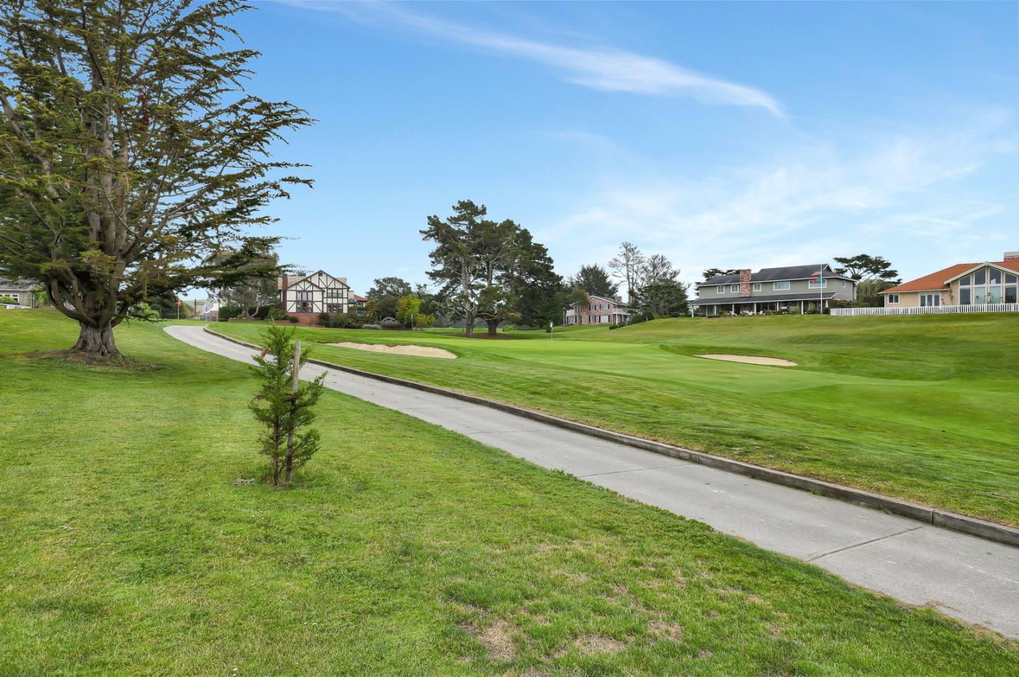 4 Muirfield Road Half Moon Bay, CA 94019 - Photo 28 of 40 a view of a golf course with a lake