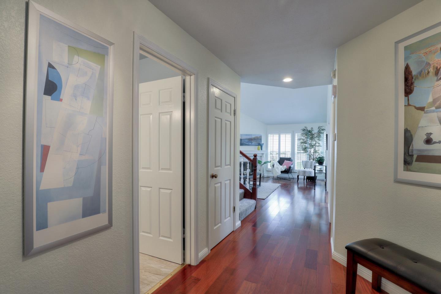 4 Muirfield Road Half Moon Bay, CA 94019 - Photo 9 of 40 a view of a hallway and dining room with wooden floor