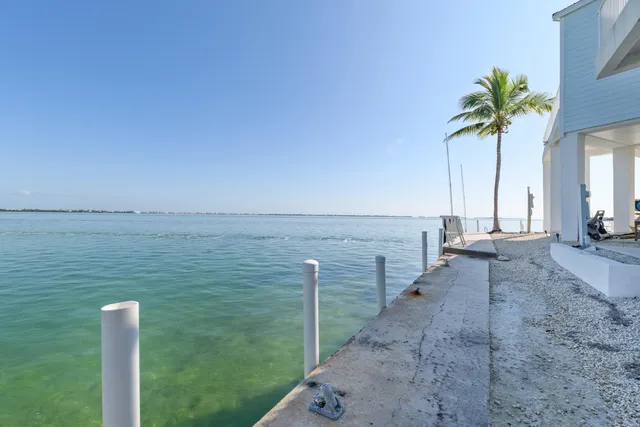 a view of a terrace with yard