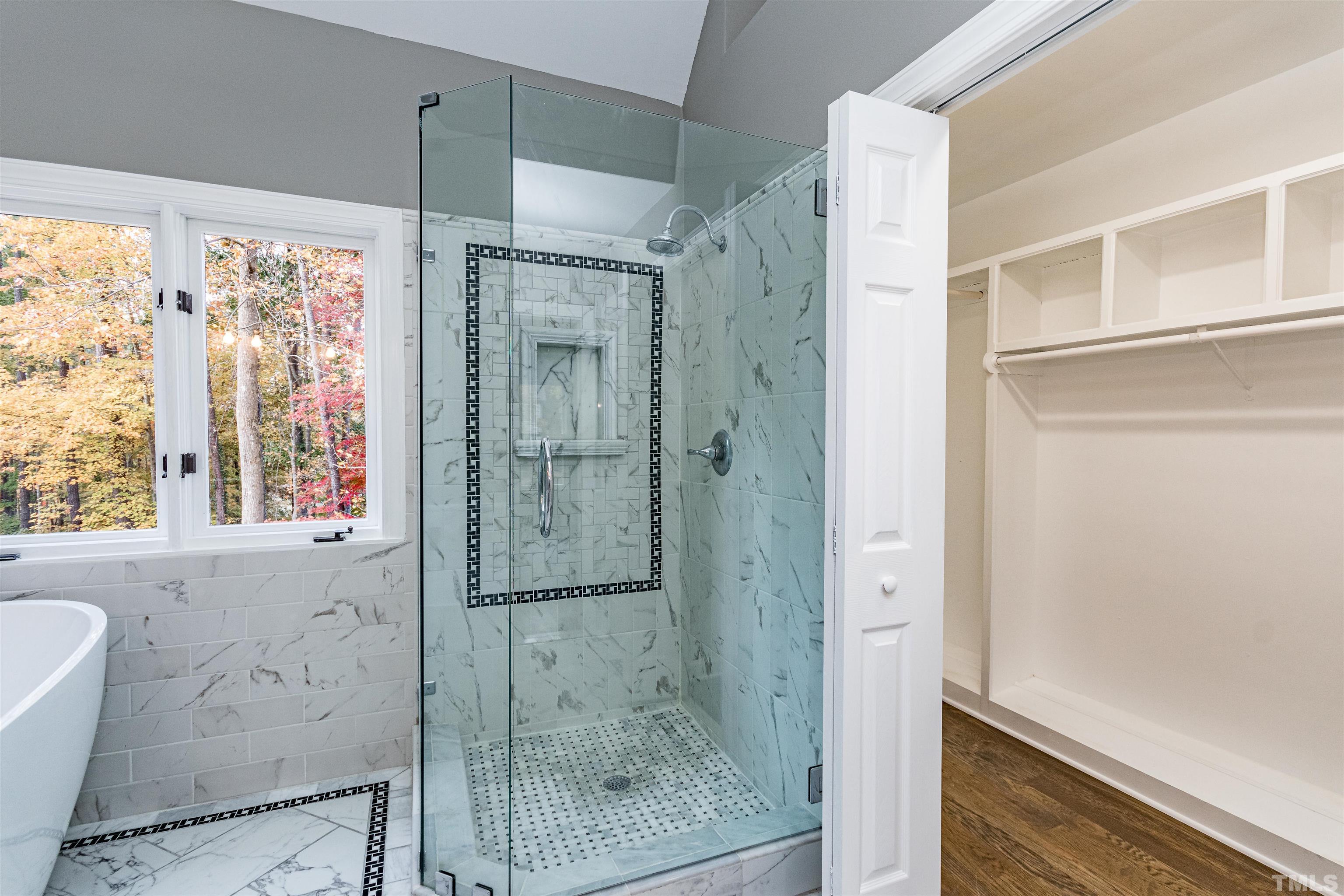 8105 Laurel Mountain Road Raleigh, NC 27613 - Photo 15 of 26 a bathroom with a shower and a sink