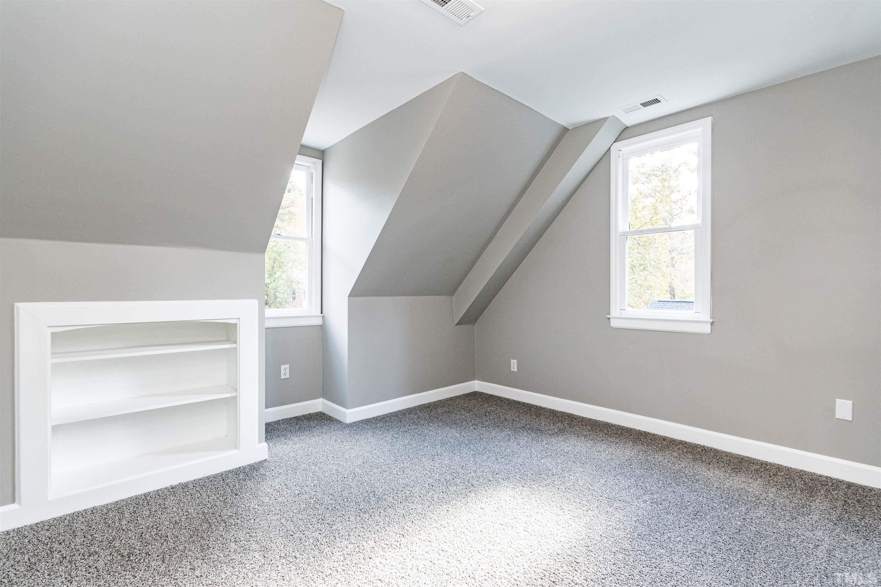 8105 Laurel Mountain Road Raleigh, NC 27613 - Photo 19 of 26 a view of an empty room with a window