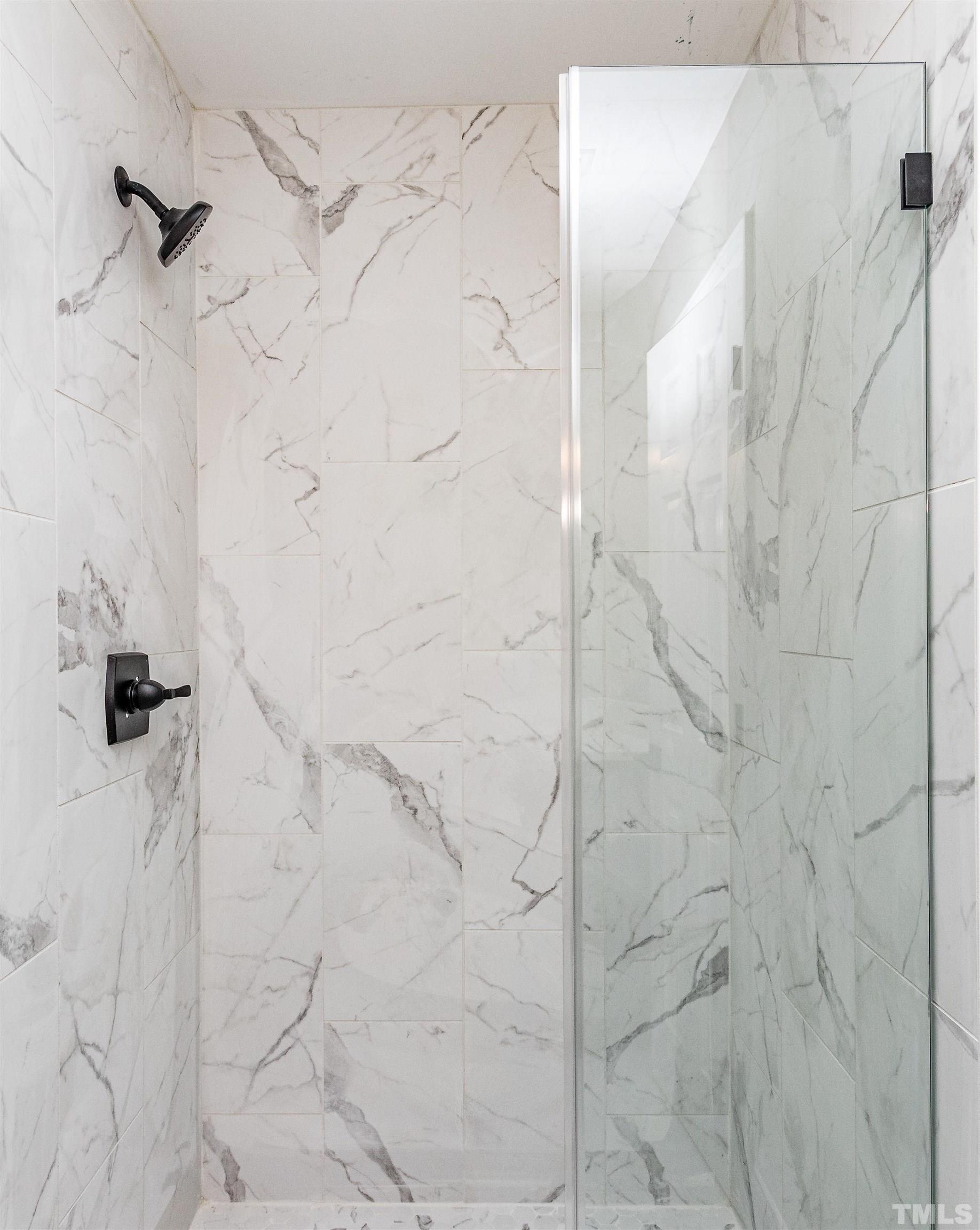 8105 Laurel Mountain Road Raleigh, NC 27613 - Photo 22 of 26 a bathroom with a shower