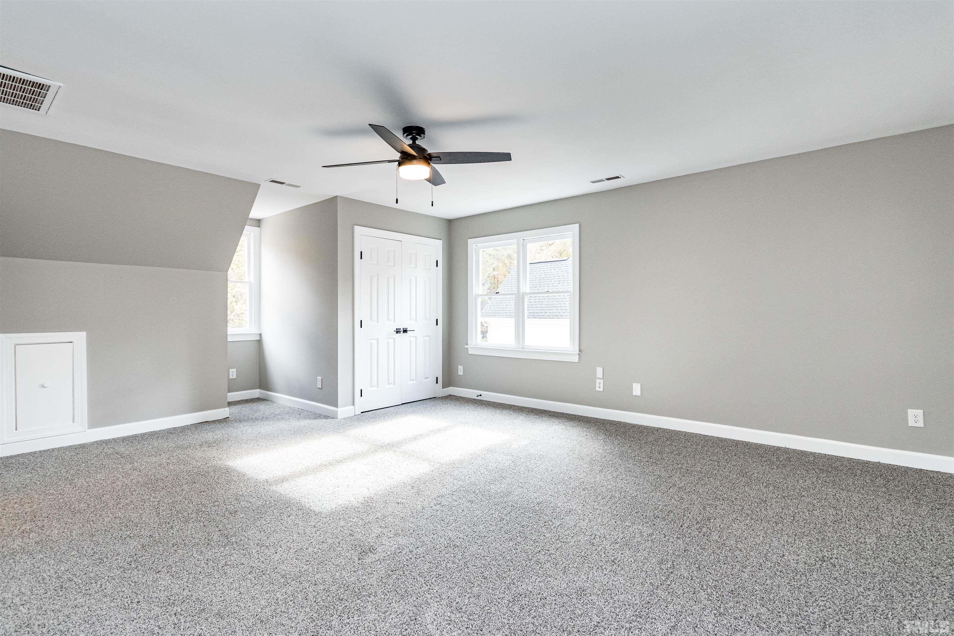 8105 Laurel Mountain Road Raleigh, NC 27613 - Photo 5 of 26 a view of an empty room with a window