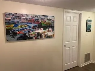 a view of a garage with rack and bicycle