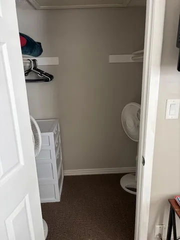 a bathroom with a toilet and a sink