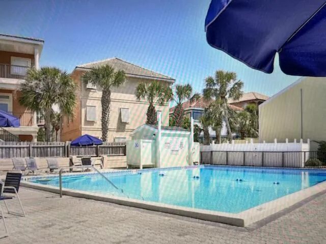 a view of a house with a yard and plants