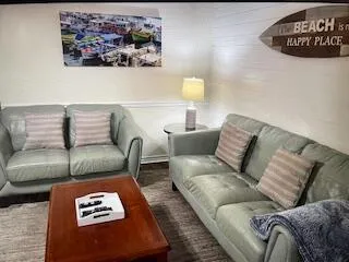 a living room with furniture and a couch