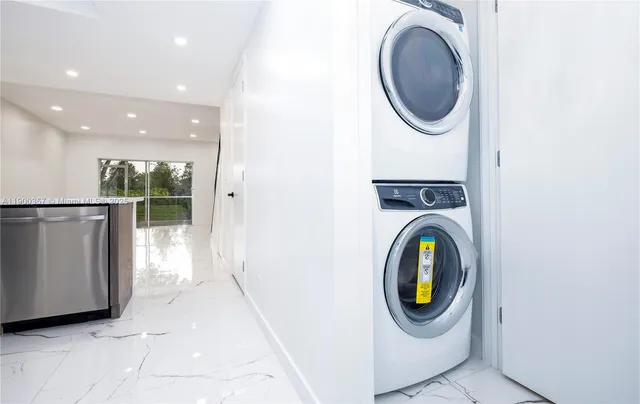 a storage room with washer and dryer