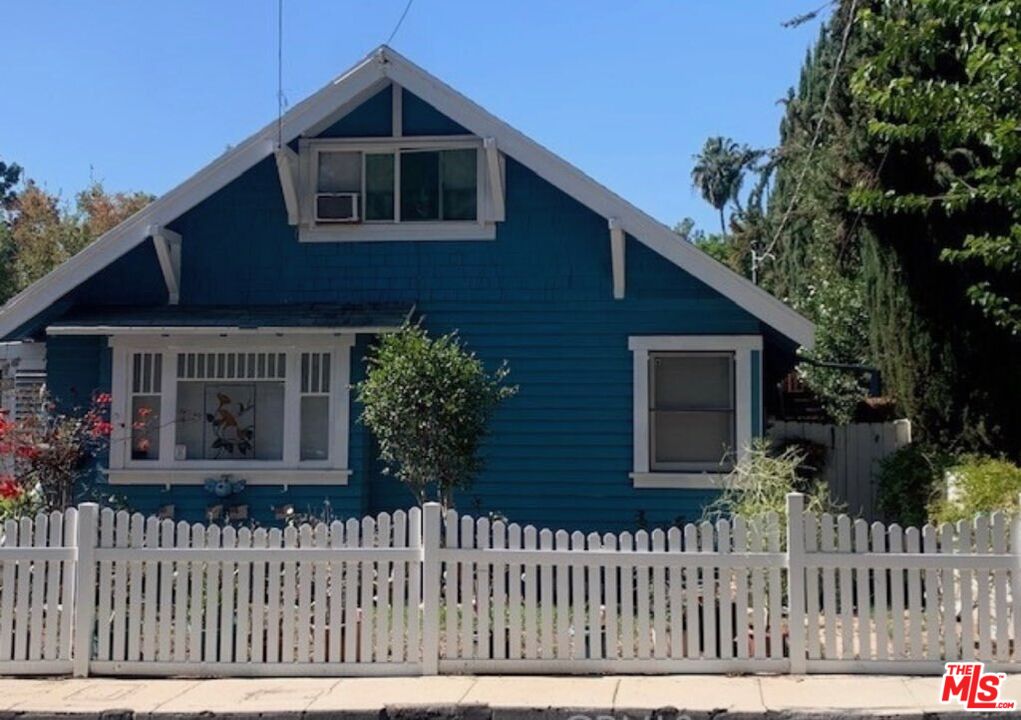 a front view of a house with a porch