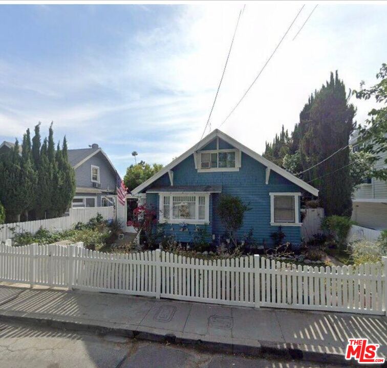 433 Maple Way Pasadena, CA 91101 - Photo 2 of 3 a front view of house with wooden fence