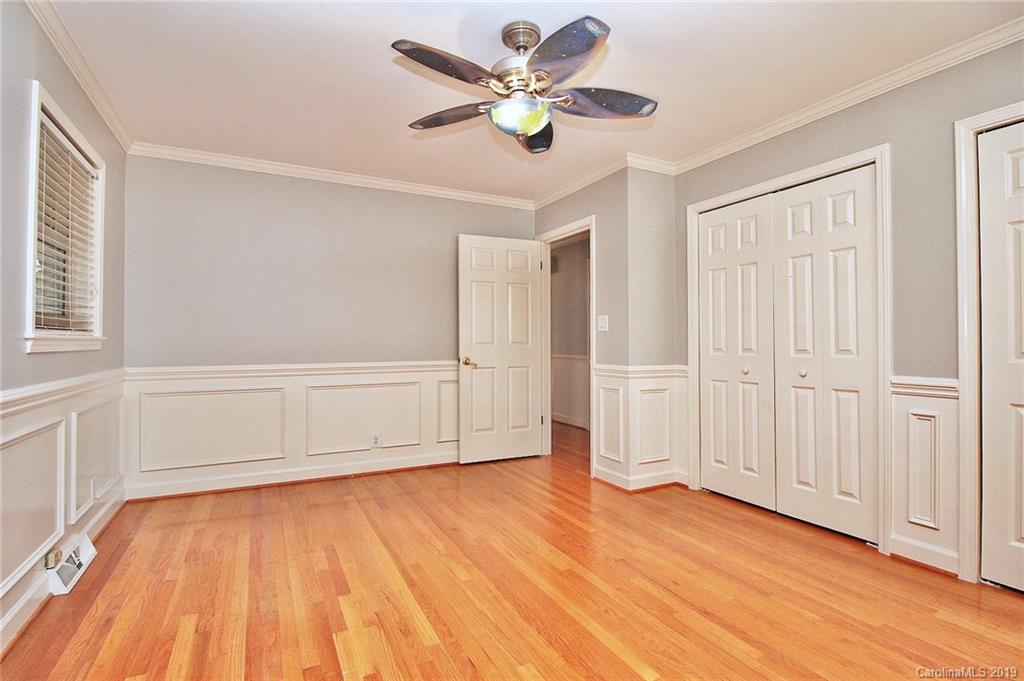 3399 Pleasant Road Fort Mill, SC 29708 - Photo 18 of 48 wooden floor in an empty room with a window