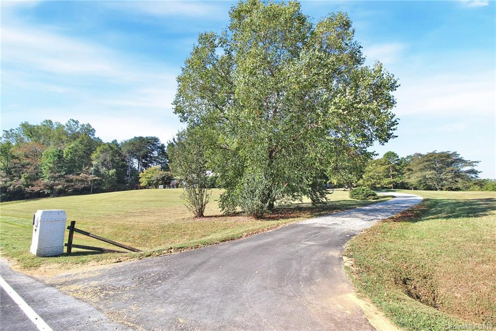 3399 Pleasant Road Fort Mill, SC 29708 - Photo 3 of 48 a view of a yard with an outdoor space