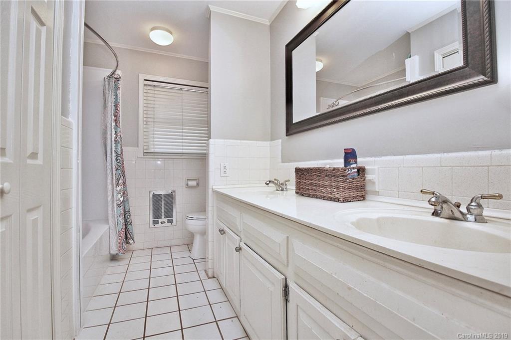 3399 Pleasant Road Fort Mill, SC 29708 - Photo 21 of 48 a bathroom with a sink a mirror and a toilet