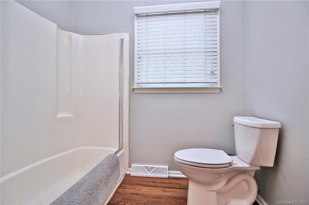 3399 Pleasant Road Fort Mill, SC 29708 - Photo 25 of 48 a bathroom with a toilet and a bathtub