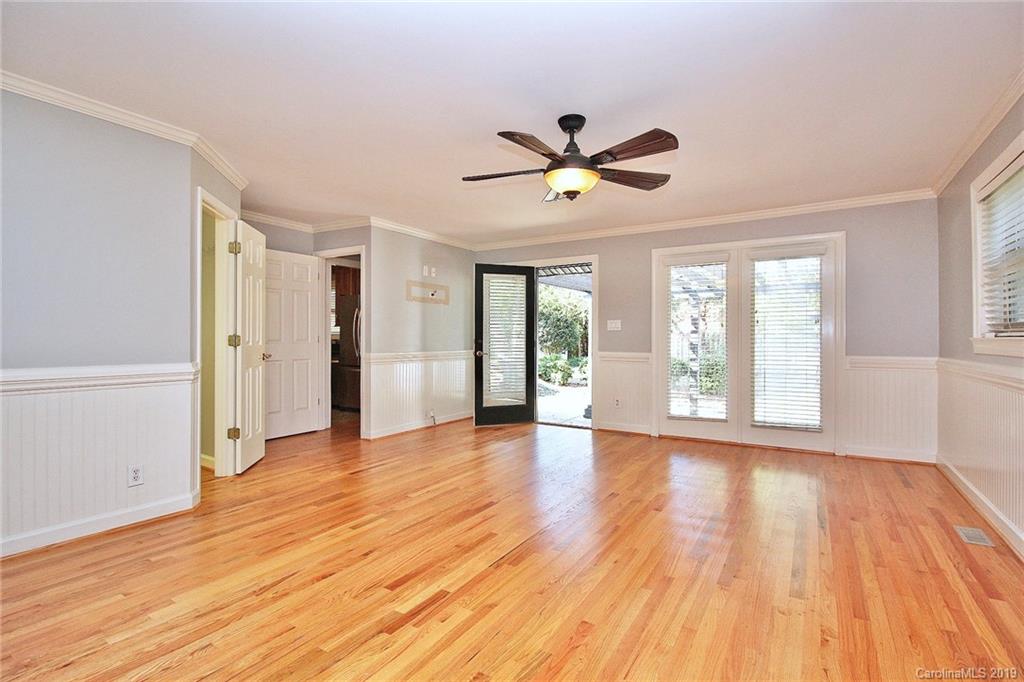 3399 Pleasant Road Fort Mill, SC 29708 - Photo 31 of 48 a view of empty room with wooden floor and fan