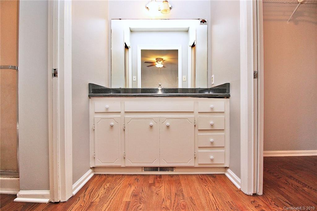 3399 Pleasant Road Fort Mill, SC 29708 - Photo 39 of 48 a view of a hallway with wooden floor and staircase